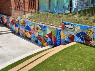 outdoor amphitheater musical mural